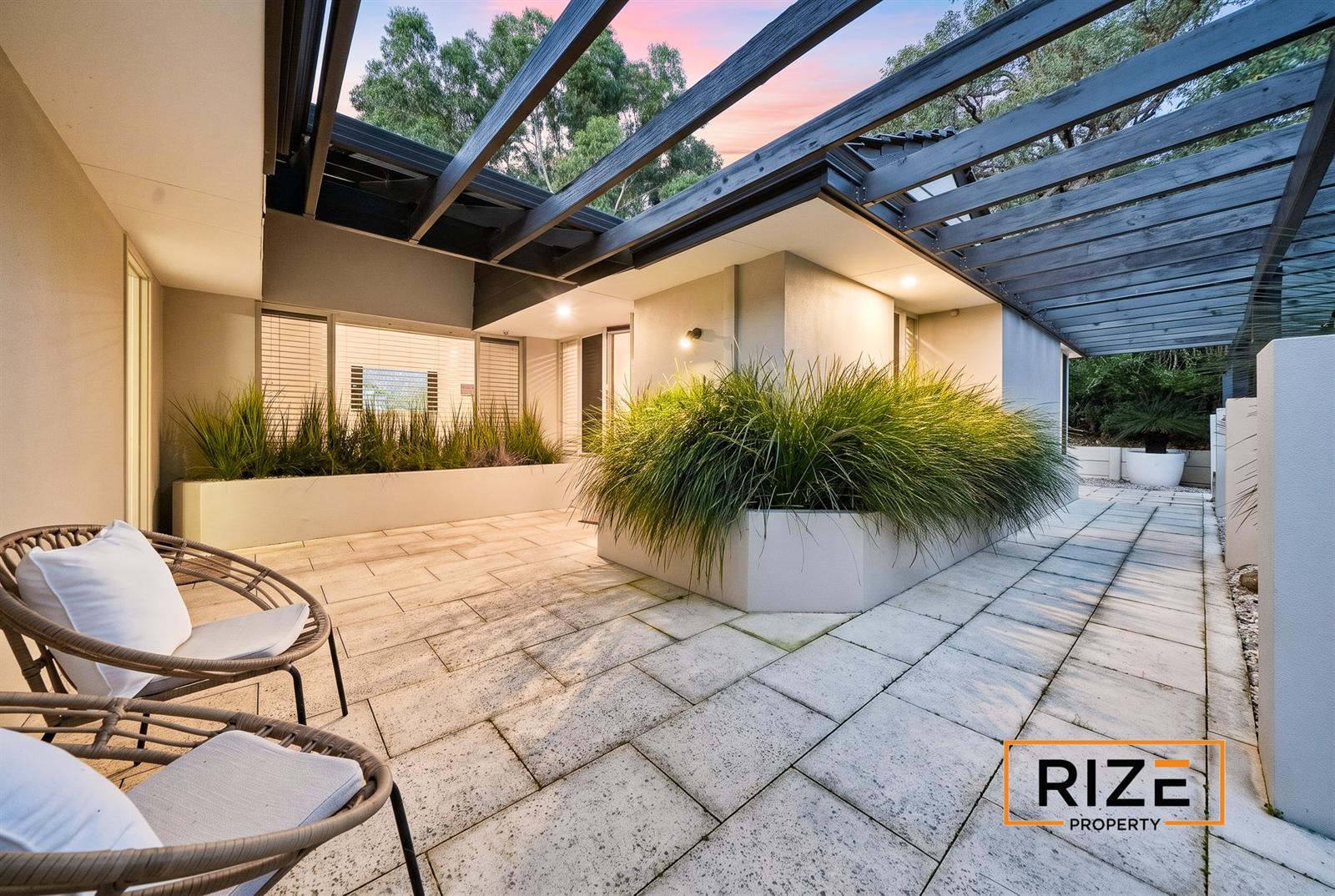The entry courtyard at dusk