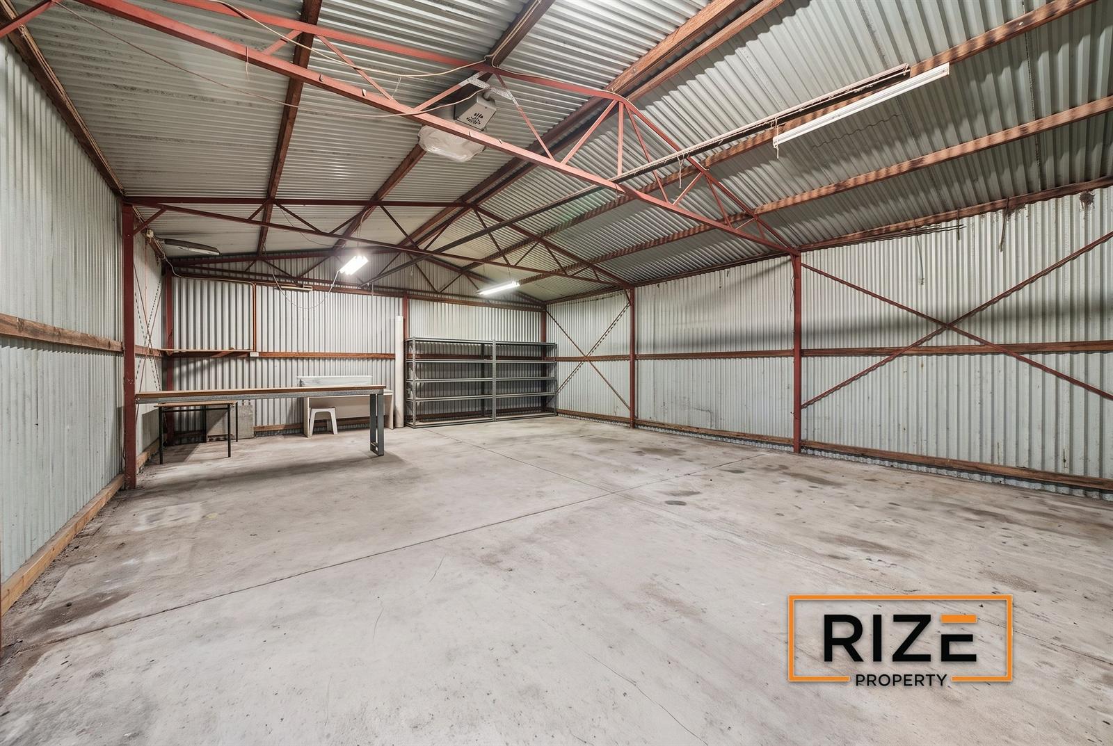 Workshop interior with three-phase power
